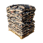 A stack of 20kg bags of Roastie-Toasties wood briquettes.