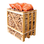 A wooden crate filled with kiln dried Ash logs, topped with a bag of Kindling Sticks.