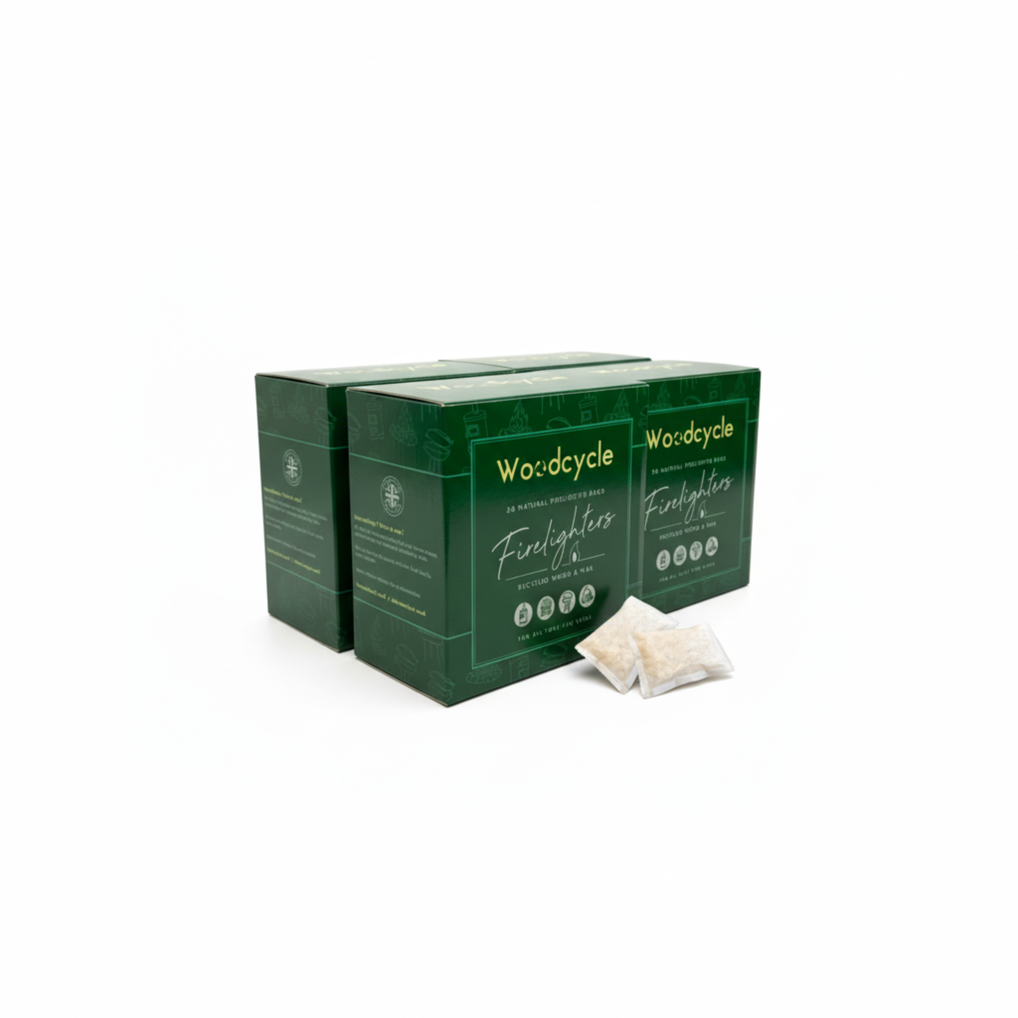Four green boxes of Woodcycle Firelighters on a white background