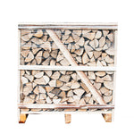 Kiln-dried Ash logs stacked in a wooden crate