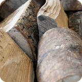 A close up picture of kiln-dried logs