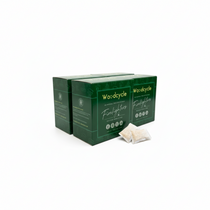 Four green boxes of Woodcycle Firelighters on a white background