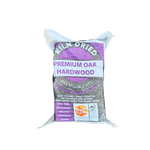 White stitched bags of kiln-dried oak logs